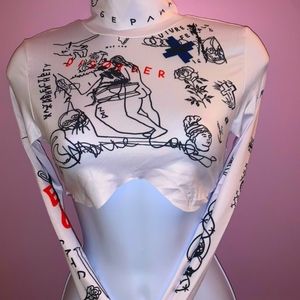 Printed DISORDER underboob mock neck crop top